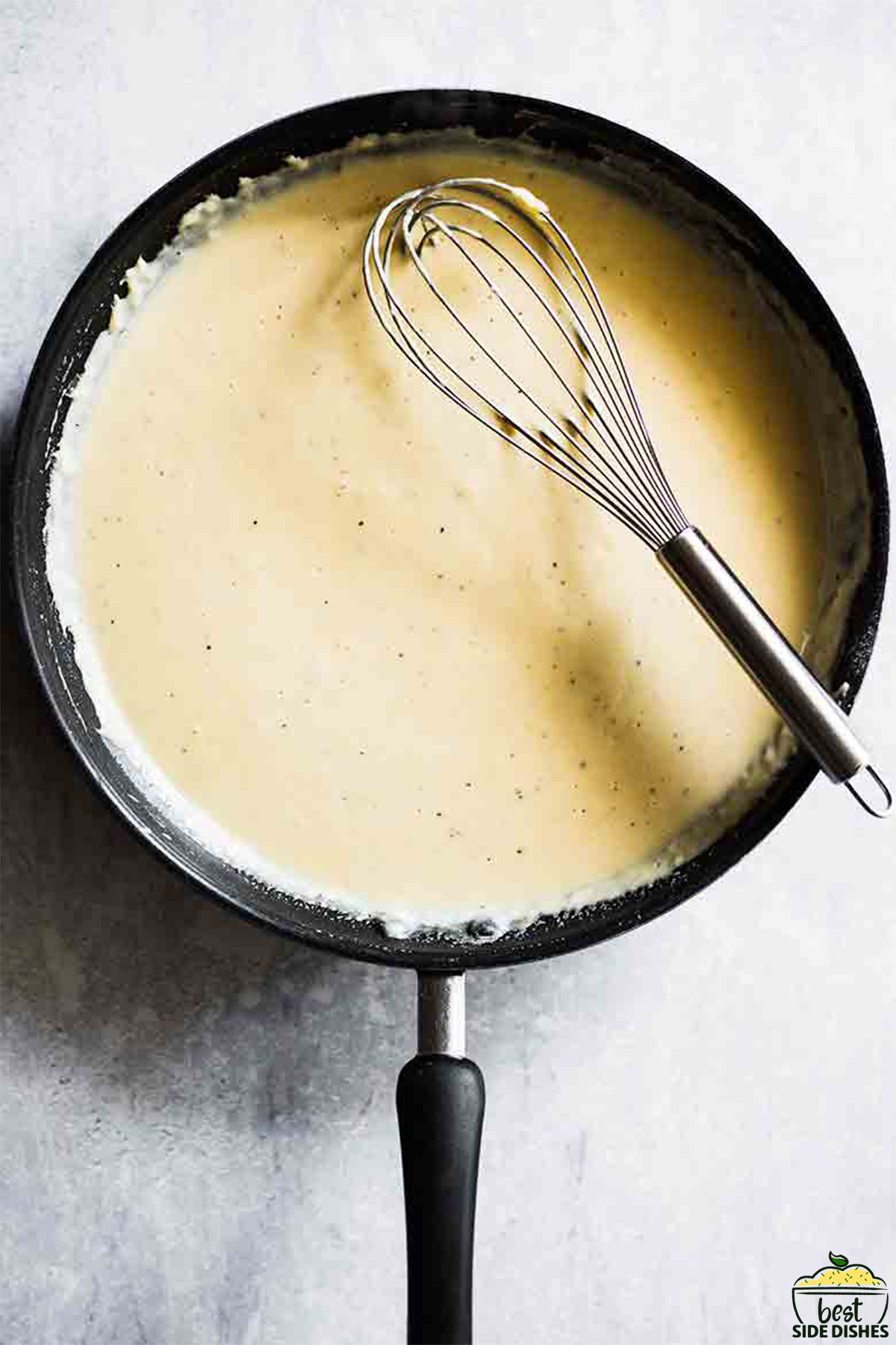 Bechamel cream sauce in a saucepan