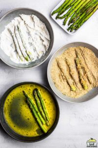asparagus fries in egg, breadcrumbs, and flour
