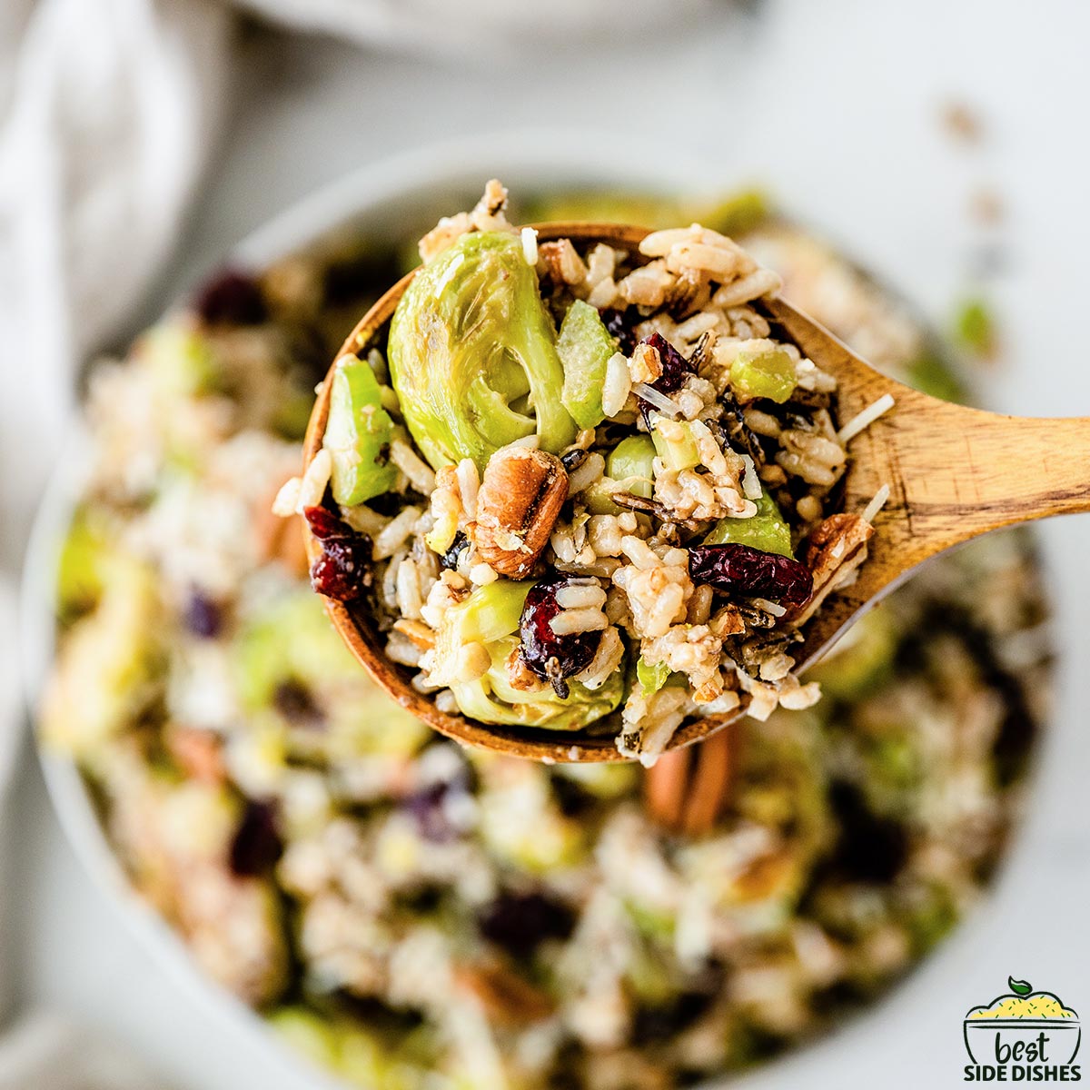 brussels sprouts salad on a wooden spoon