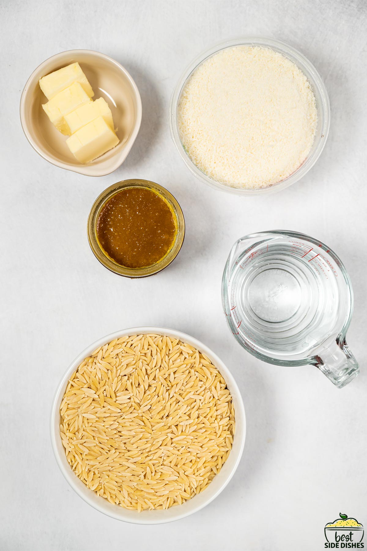 orzo pasta ingredients on a white surface