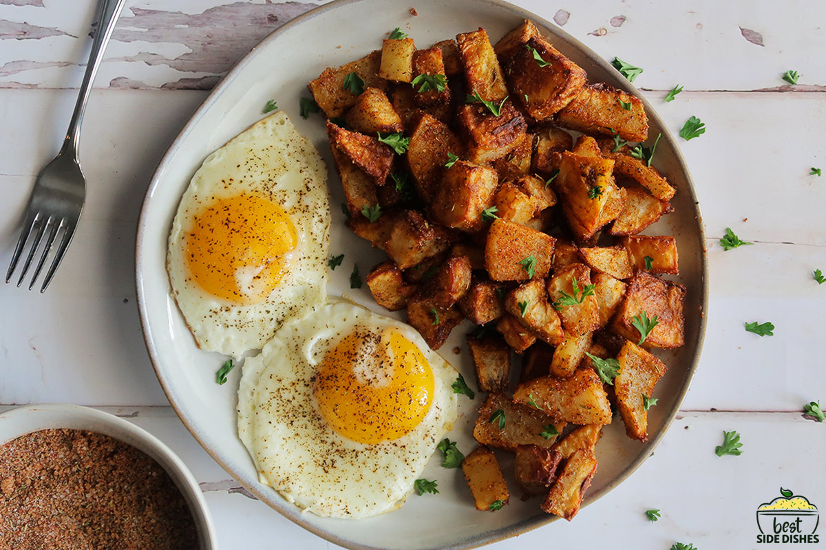 air fried potatoes on a plate with eggs