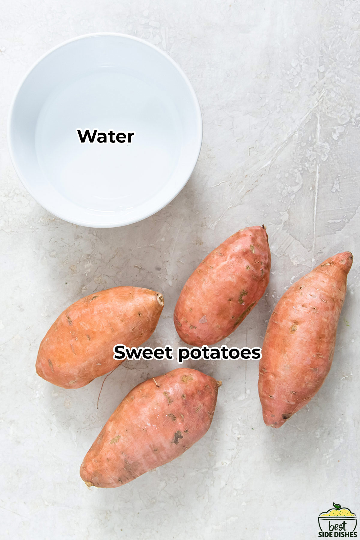 the ingredients for sweet potatoes on a counter with labels, including four sweet potatoes and a white dish of water