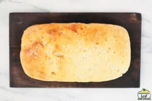 slow cooker bread on a wood cutting board