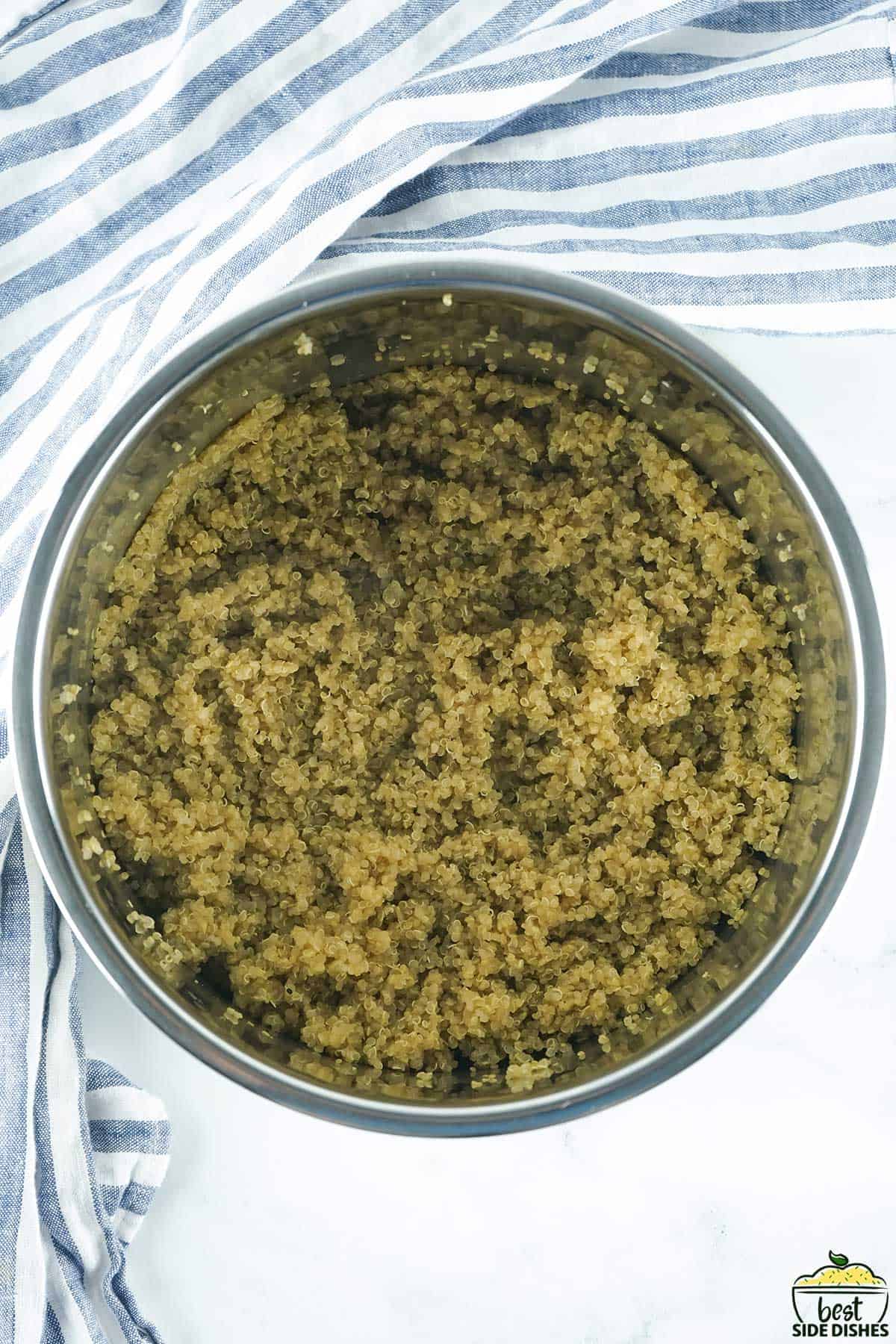 fully cooked fluffy quinoa in the Instant Pot pan