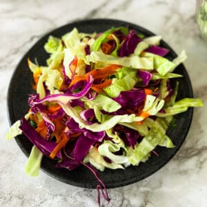 a dish of completed asian slaw