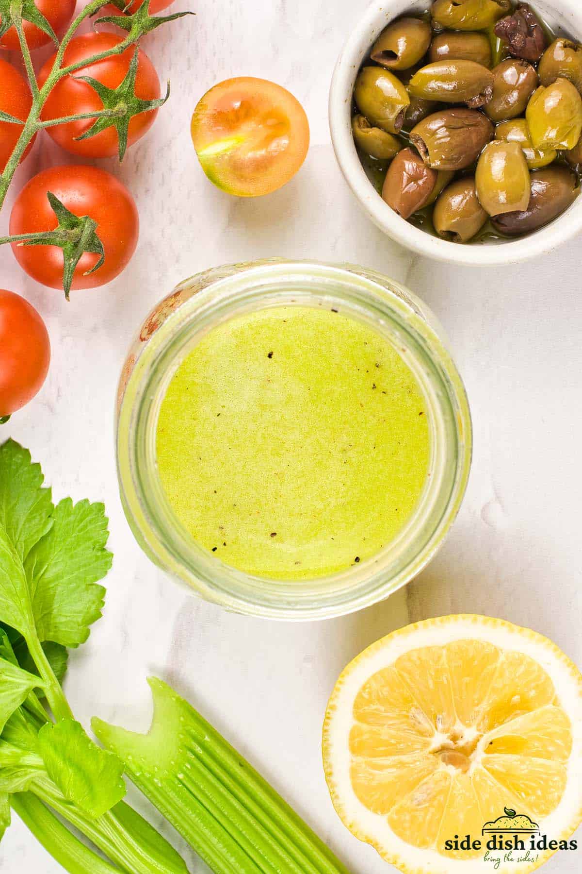 olive oil vinaigrette in a jar after mixing with celery juice